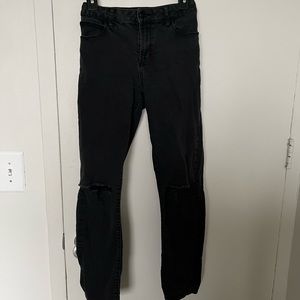 Black jeans with knee rips